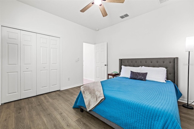 3071 Marine Grass Dr, Wimauma, FL 33598 - bedroom featuring wood finished floors, ceiling fan, a closet, and baseboards