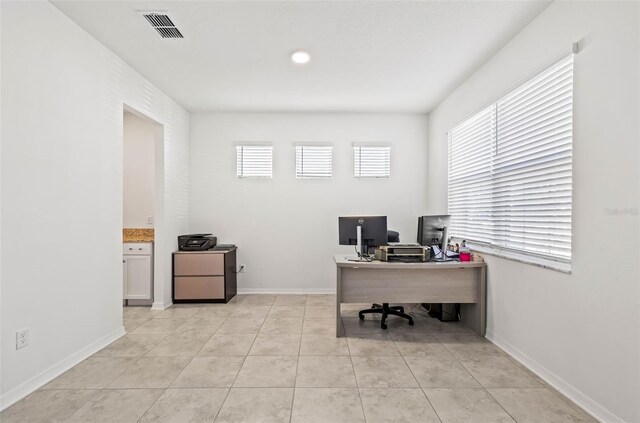 3071 Marine Grass Dr, Wimauma, FL 33598 - office featuring light tile patterned flooring and baseboards
