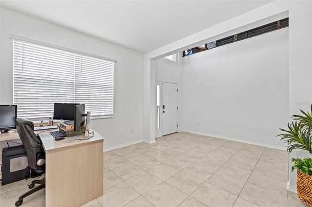 3071 Marine Grass Dr, Wimauma, FL 33598 - office area with light tile patterned floors and baseboards