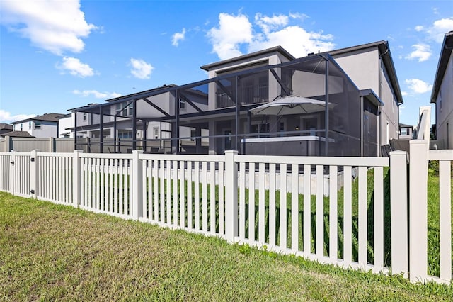 3071 Marine Grass Dr, Wimauma, FL 33598 - view of property exterior with a lanai and stucco siding