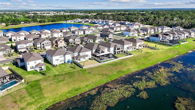 3071 Marine Grass Dr, Wimauma, FL 33598 - aerial perspective of suburban area with a large body of water