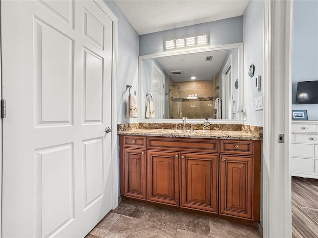 205 Brightwater Dr Unit 101, Clearwater Beach, FL 33767 - full bath with vanity and a stall shower