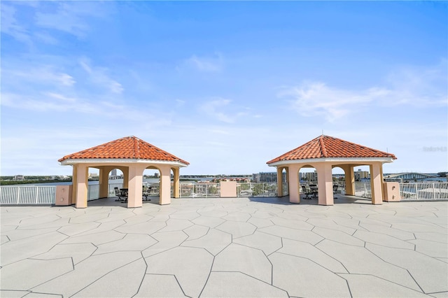 205 Brightwater Dr Unit 101, Clearwater Beach, FL 33767 - view of home's community with a gazebo and a patio area