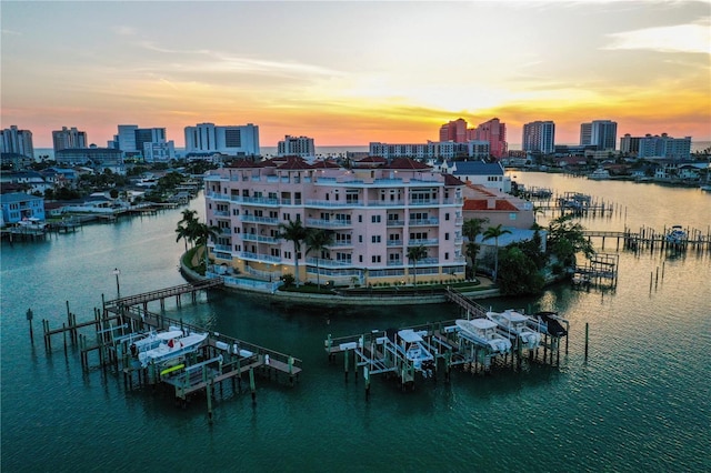 205 Brightwater Dr Unit 101, Clearwater Beach, FL 33767 - water view featuring city skyline and boat lift