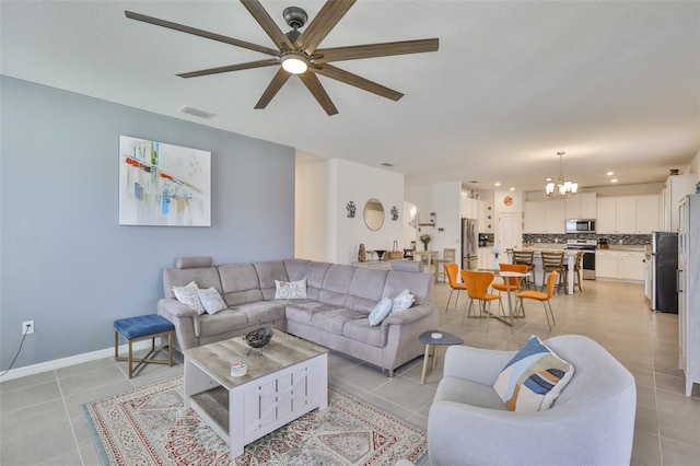 11924 Brighton Knoll Loop, Riverview, FL 33579 - living room featuring ceiling fan, light tile patterned floors, a chandelier, baseboards, and recessed lighting