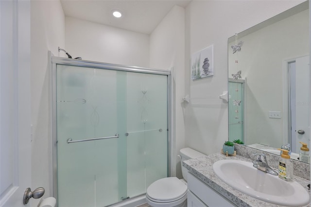 11924 Brighton Knoll Loop, Riverview, FL 33579 - full bathroom featuring a shower stall, toilet, and vanity
