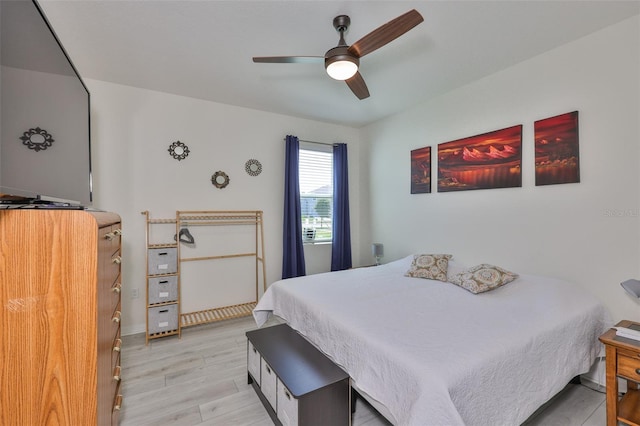 11924 Brighton Knoll Loop, Riverview, FL 33579 - bedroom featuring wood finished floors and a ceiling fan