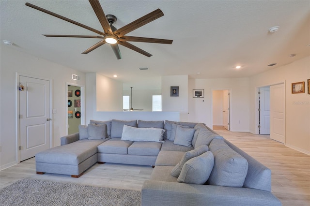 11924 Brighton Knoll Loop, Riverview, FL 33579 - living room with ceiling fan, light wood-type flooring, recessed lighting, and baseboards