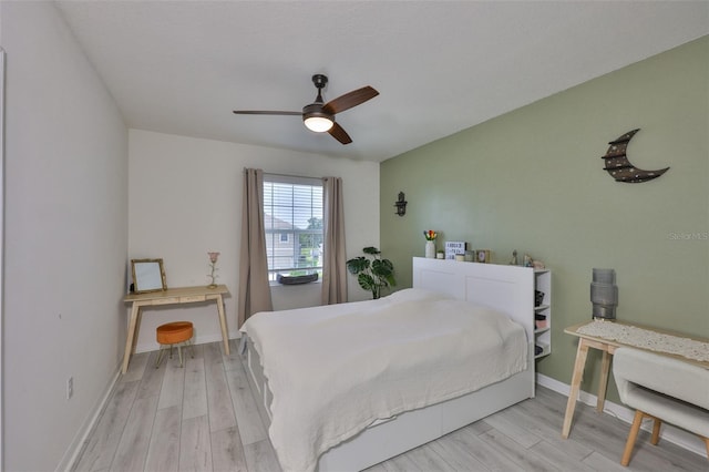 11924 Brighton Knoll Loop, Riverview, FL 33579 - bedroom featuring light wood-style floors, baseboards, and ceiling fan