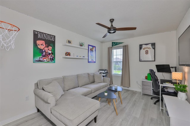 11924 Brighton Knoll Loop, Riverview, FL 33579 - living room with ceiling fan, light wood-type flooring, a desk, and baseboards