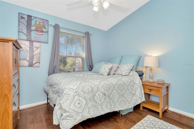 bedroom with wood finished floors, baseboards, lofted ceiling, and a ceiling fan