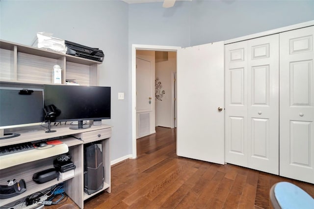 office space with dark wood-style flooring and a ceiling fan