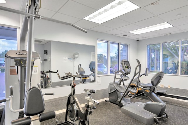 gym featuring a drop ceiling