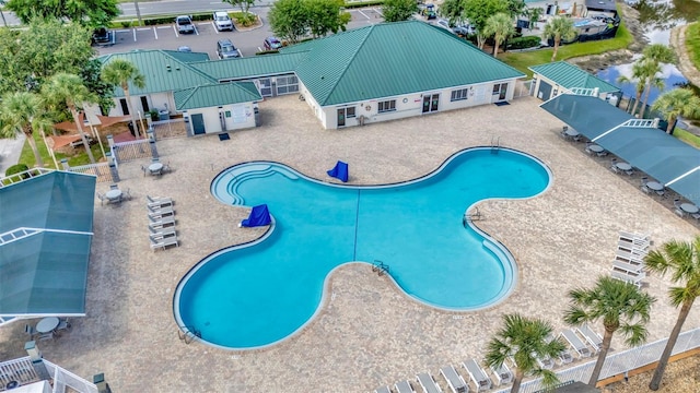 community pool featuring fence