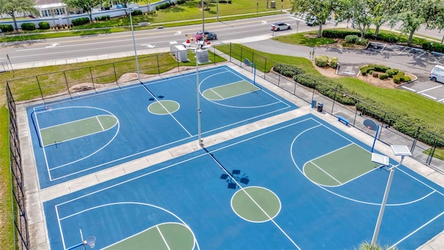 view of sport court featuring community basketball court and fence
