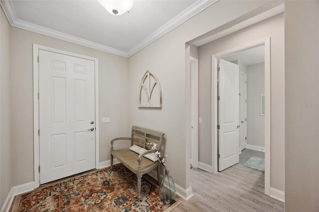 764 W Bayshore Dr, Tarpon Springs, FL 34689 - entrance foyer with ornamental molding, light wood-type flooring, and baseboards