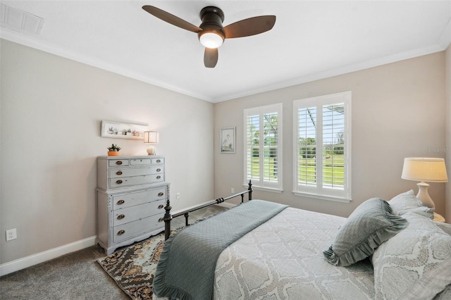 764 W Bayshore Dr, Tarpon Springs, FL 34689 - bedroom featuring crown molding, baseboards, carpet floors, and a ceiling fan