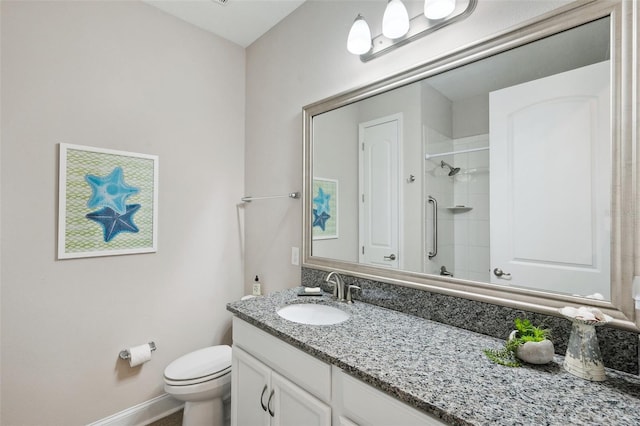 764 W Bayshore Dr, Tarpon Springs, FL 34689 - full bathroom featuring toilet, vanity, a shower, and baseboards