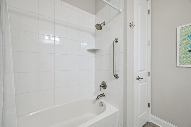764 W Bayshore Dr, Tarpon Springs, FL 34689 - full bath featuring baseboards and shower / tub combo with curtain