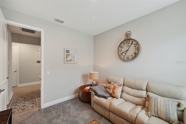 764 W Bayshore Dr, Tarpon Springs, FL 34689 - carpeted living room with baseboards