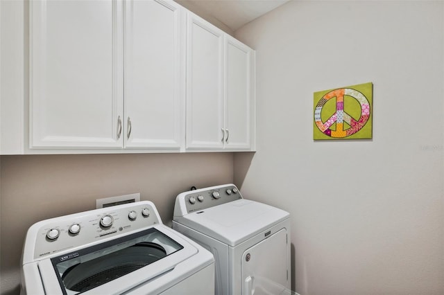 764 W Bayshore Dr, Tarpon Springs, FL 34689 - clothes washing area featuring cabinet space and independent washer and dryer