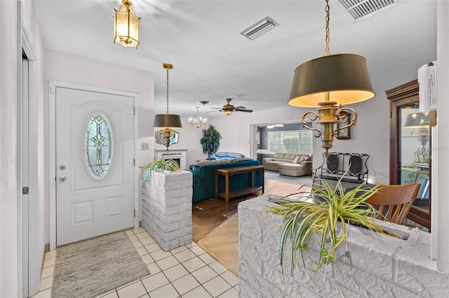6801 Pinellas Point Dr S, Saint Petersburg, FL 33712 - entrance foyer featuring ceiling fan and light tile patterned floors