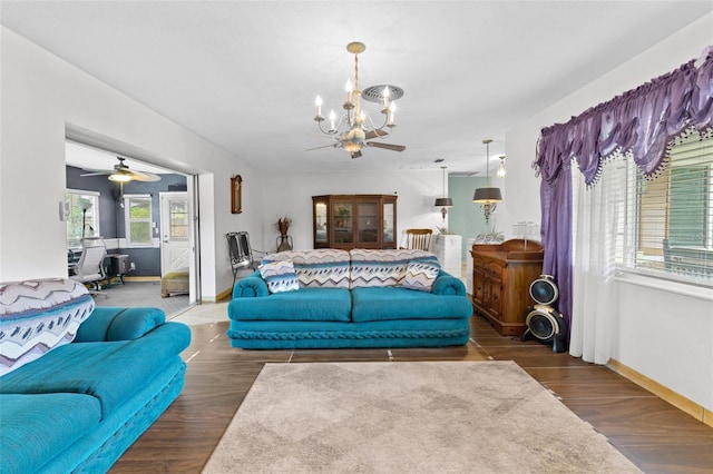 6801 Pinellas Point Dr S, Saint Petersburg, FL 33712 - living area with a chandelier, baseboards, ceiling fan, and wood finished floors