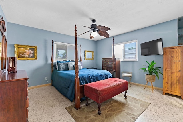 6801 Pinellas Point Dr S, Saint Petersburg, FL 33712 - bedroom featuring baseboards, speckle patterned floor, and a ceiling fan
