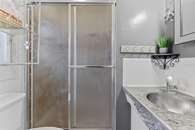 6801 Pinellas Point Dr S, Saint Petersburg, FL 33712 - bathroom with toilet, vanity, and a shower stall