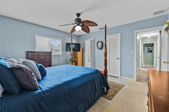 6801 Pinellas Point Dr S, Saint Petersburg, FL 33712 - bedroom featuring speckled floor, ceiling fan, and baseboards