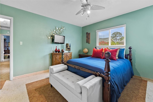 6801 Pinellas Point Dr S, Saint Petersburg, FL 33712 - bedroom featuring speckle patterned floor, baseboards, and a ceiling fan