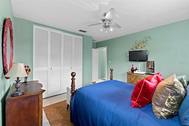 6801 Pinellas Point Dr S, Saint Petersburg, FL 33712 - bedroom with a closet, speckle patterned floor, and a ceiling fan