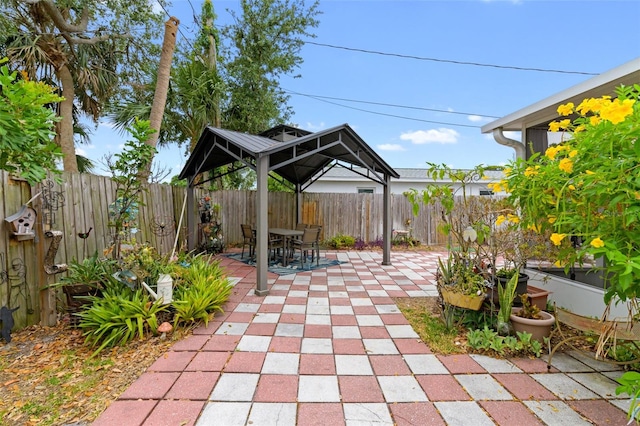 6801 Pinellas Point Dr S, Saint Petersburg, FL 33712 - fenced backyard featuring a gazebo and a patio area