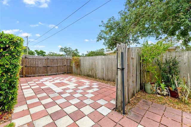 6801 Pinellas Point Dr S, Saint Petersburg, FL 33712 - fenced backyard featuring a gate and a patio