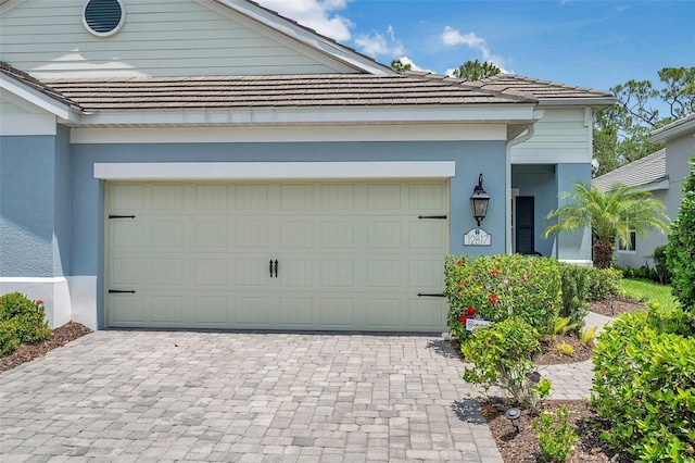 12817 Cobalt Ter, Bradenton, FL 34211 - garage with decorative driveway