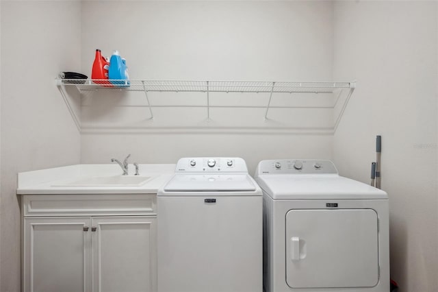 12817 Cobalt Ter, Bradenton, FL 34211 - washroom featuring independent washer and dryer and cabinet space