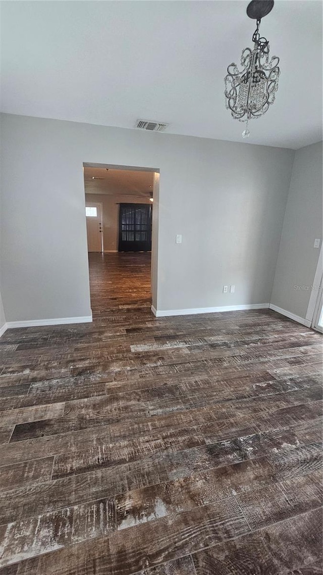 39772 Meadowood Loop, Zephyrhills, FL 33542 - empty room featuring wood finished floors