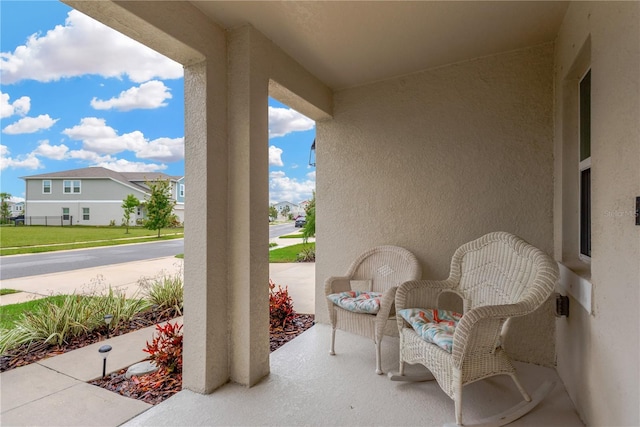view of patio featuring a residential view