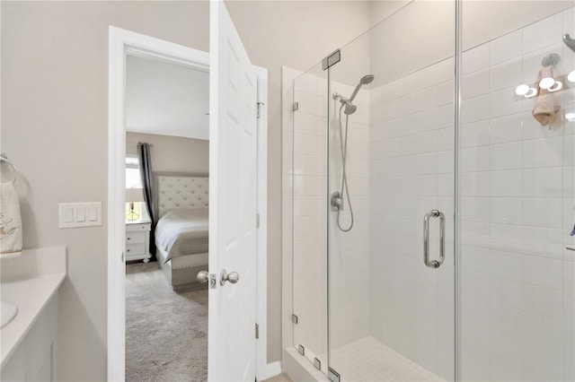 full bathroom with a shower stall, ensuite bath, and vanity