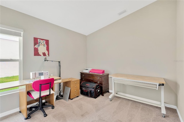 home office with carpet floors and baseboards