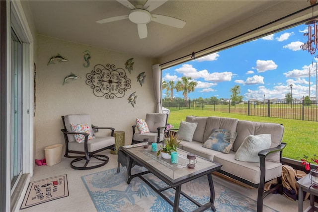 sunroom / solarium with an outdoor hangout area and ceiling fan