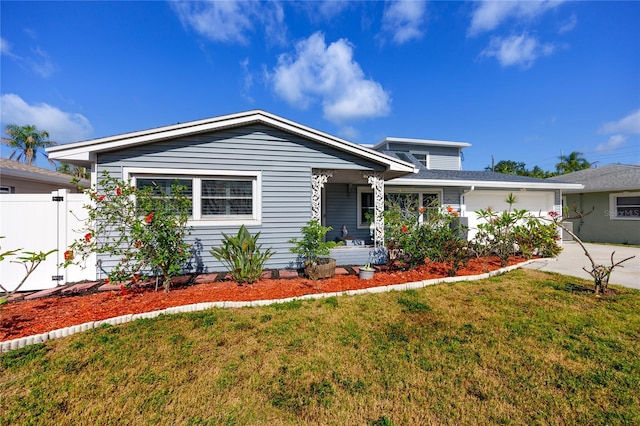 6536 115th Ln, Seminole, FL 33772 - view of front of house featuring a garage and driveway