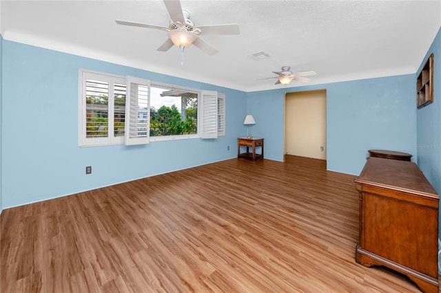 6536 115th Ln, Seminole, FL 33772 - unfurnished room with ceiling fan and light wood finished floors