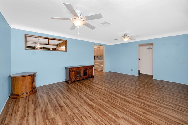 6536 115th Ln, Seminole, FL 33772 - spare room with a ceiling fan and light wood-style flooring