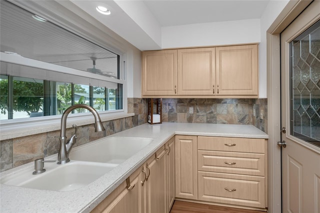 6536 115th Ln, Seminole, FL 33772 - kitchen with a sink, light brown cabinets, and light countertops