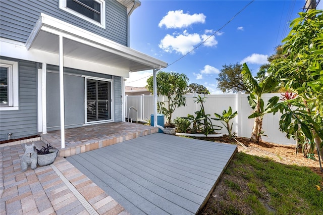 6536 115th Ln, Seminole, FL 33772 - deck featuring a fenced backyard and a patio area