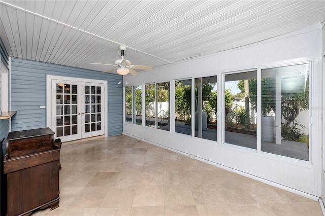 6536 115th Ln, Seminole, FL 33772 - unfurnished sunroom featuring french doors, plenty of natural light, and wooden ceiling
