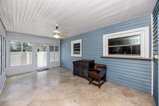 6536 115th Ln, Seminole, FL 33772 - unfurnished sunroom with ceiling fan