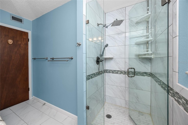 6536 115th Ln, Seminole, FL 33772 - bathroom with a stall shower, a textured ceiling, baseboards, and marble finish flooring