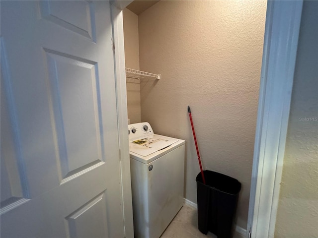 13243 Sanctuary Cove Dr Unit 204, Temple Terrace, FL 33637 - clothes washing area with washer / dryer and a textured wall